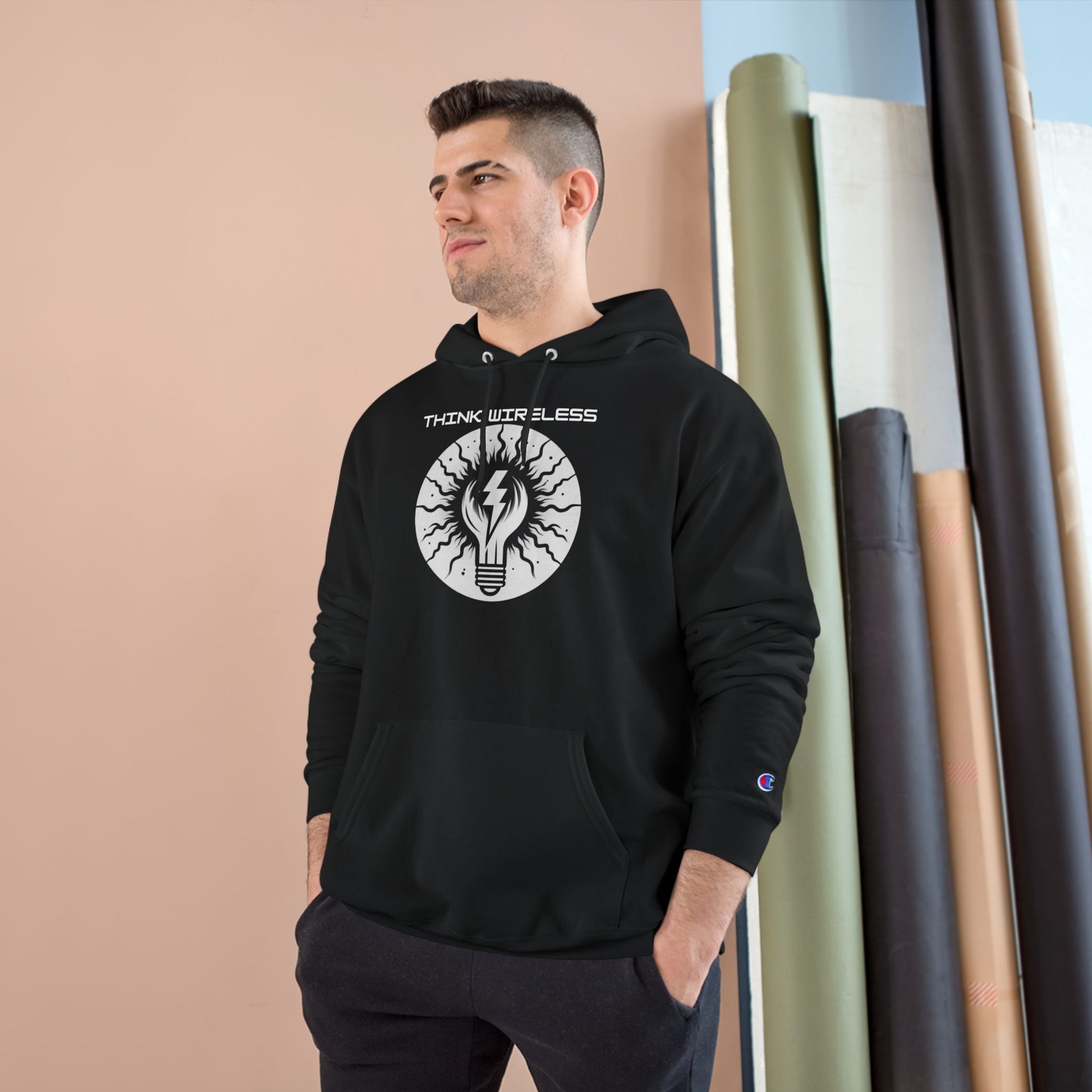 Person wearing OG "Think Wireless" hoodie outdoors